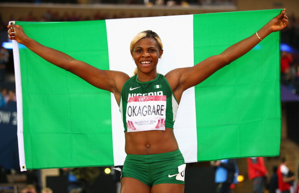 GLASGOW, SCOTLAND - JULY 31: Blessing Okagbare of Nigeria celebrates winning gold in the Women's 200m Final at Hampden Park during day eight of the Glasgow 2014 Commonwealth Games on July 31, 2014 in Glasgow, United Kingdom. (Photo by Ian Walton/Getty Images)