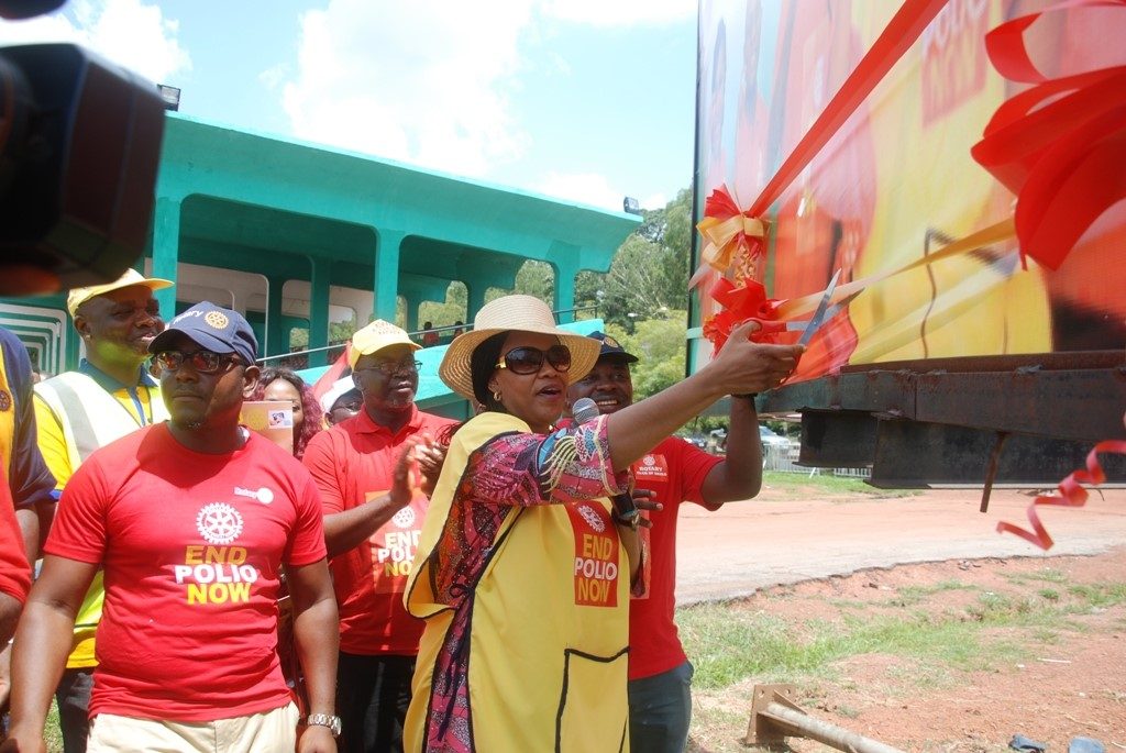 wife-of-enugu-state-governor-mrs-monica-ugwuanyi-cutting-the-tape-to-flag-off-world-polio-day-programme-at-michael-okpara-square-enugu-yesterday