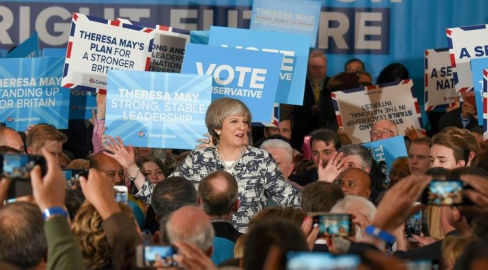Theresa May fails to win majority, exit polls predict