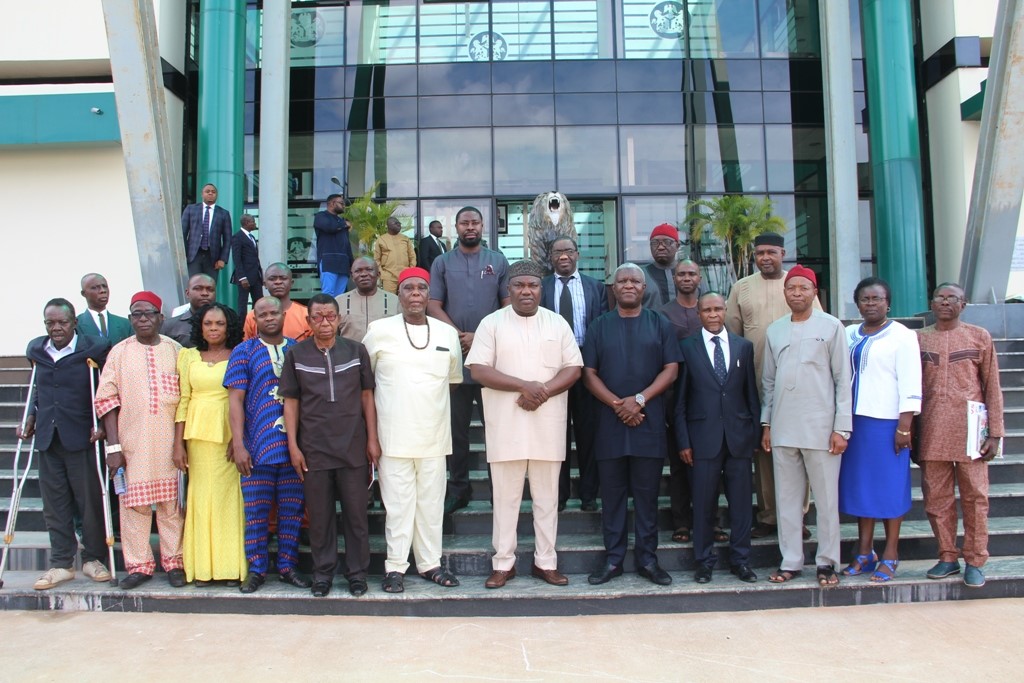 Governor Ifeanyi Ugwuanyi of Enugu State (6th right), with a delegation of Enugu State Coalition of Business and Professional Association, when their chairman, Rev. Ugo Chime led them on a courtesy visit at the Government House, Enugu, yesterday.