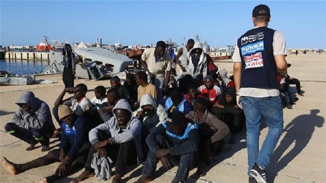 Interpol arrests 40 human traffickers after Libya slave auction
