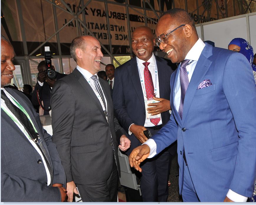 L-R: General Manager, Government Relations of Shell Petroleum Development Company, Bashir Bello; Shell’s Vice President, Nigeria and Gabon, Peter Costello; and Country Chair, Shell Companies in Nigeria and Managing Director, The Shell Petroleum Development Company, Osagie Okunbor, receiving the Minister of State for Petroleum Resources, Dr. Ibe Kachikwu at the Shell exhibition stand on Monday at the opening session of the 2018 Nigeria International Petroleum Summit in Abuja.