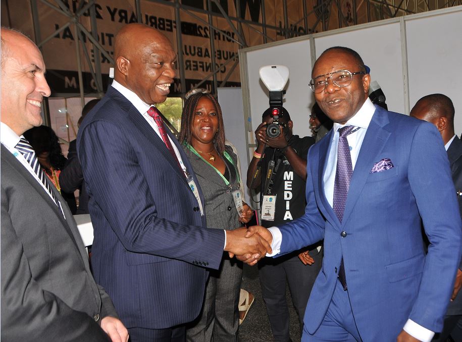 L-R: Shell’s Vice President, Nigeria and Gabon, Peter Costello; and Country Chair, Shell Companies in Nigeria and Managing Director, Shell Petroleum Development Company, Osagie Okunbor, both receiving the Minister of State for Petroleum Resources, Dr. Ibe Kachikwu, at the Shell exhibition stand on Monday at the opening session of the 2018 Nigeria International Petroleum Summit in Abuja.