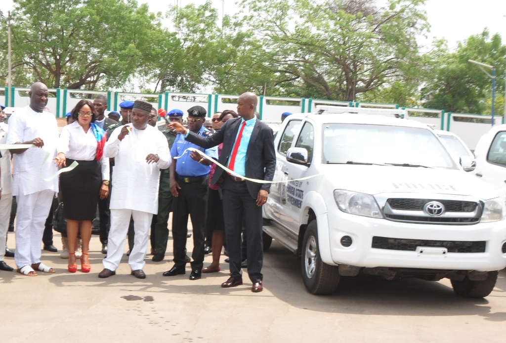 Gov. Ifeanyi Ugwuanyi of Enugu State (middle), with his deputy, Mrs. Cecilia Ezeilo (2nd left); the Speaker of Enugu State House of Assembly, Rt. Hon. Edward Ubosi (left); and the state Commissioner of Police, Danmallam Mohammed (2nd right); and other officials of the government during the presentation of 22 brand new patrol vans to the Nigerian Police Force, Enugu Command, at the Government House, Enugu, yesterday