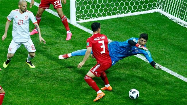 Spain edge past Iran in first World Cup win