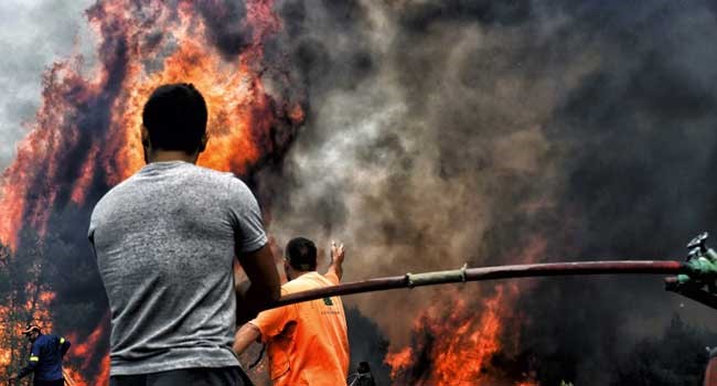 74 die as wildfire ravages Greek seaside