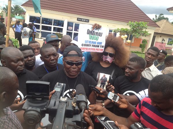 Coalition besieges Police HQ, demands release of Premium Times reporter