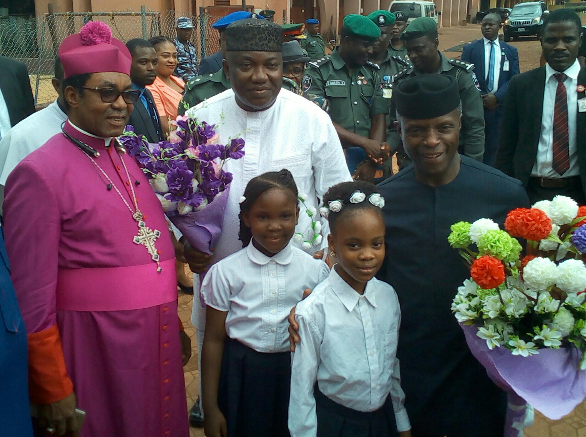 Acting President of Nigeria, Prof. Yemi Osinbajo (right); Governor Ifeanyi Ugwuanyi of Enugu State (middle); Archbishop of Enugu Ecclesiastical Province (Anglican Communion), Dr. Emmanuel Chukwuma (left) and the bouquet bearers, during the 30th National Biennial Conference of the Student Christian Movement (SCM) of Nigeria, in Enugu, yesterday.
