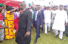 Gov. Ifeanyi Ugwuanyi of Enugu State (right) acknowledging cheers from his supporters during the Permanent Voters Card (PVC) collection sensitization programme, tagged “Operation Get Your PVC Now” organised by Voters’ Support Group (VSG) Enugu West Senatorial District, held in Oji-River Local Government Area, yesterday