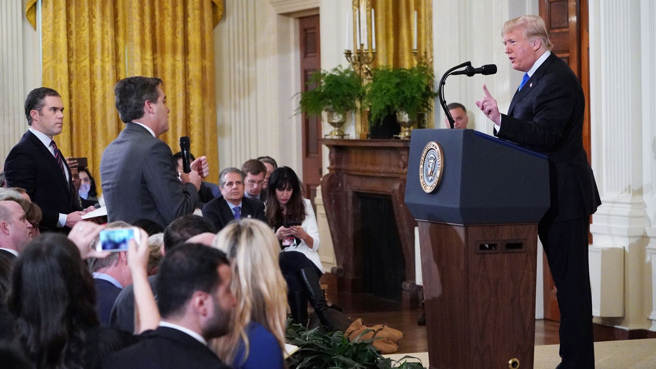 White House bars CNN reporter after heated Trump exchange