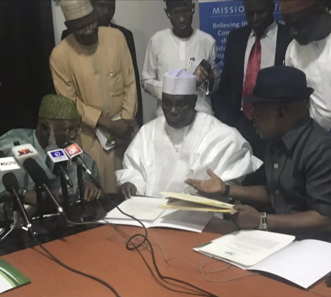 Atiku asks Buhari to sign electoral bill