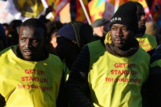 Thousands march in Rome against anti-migrant law