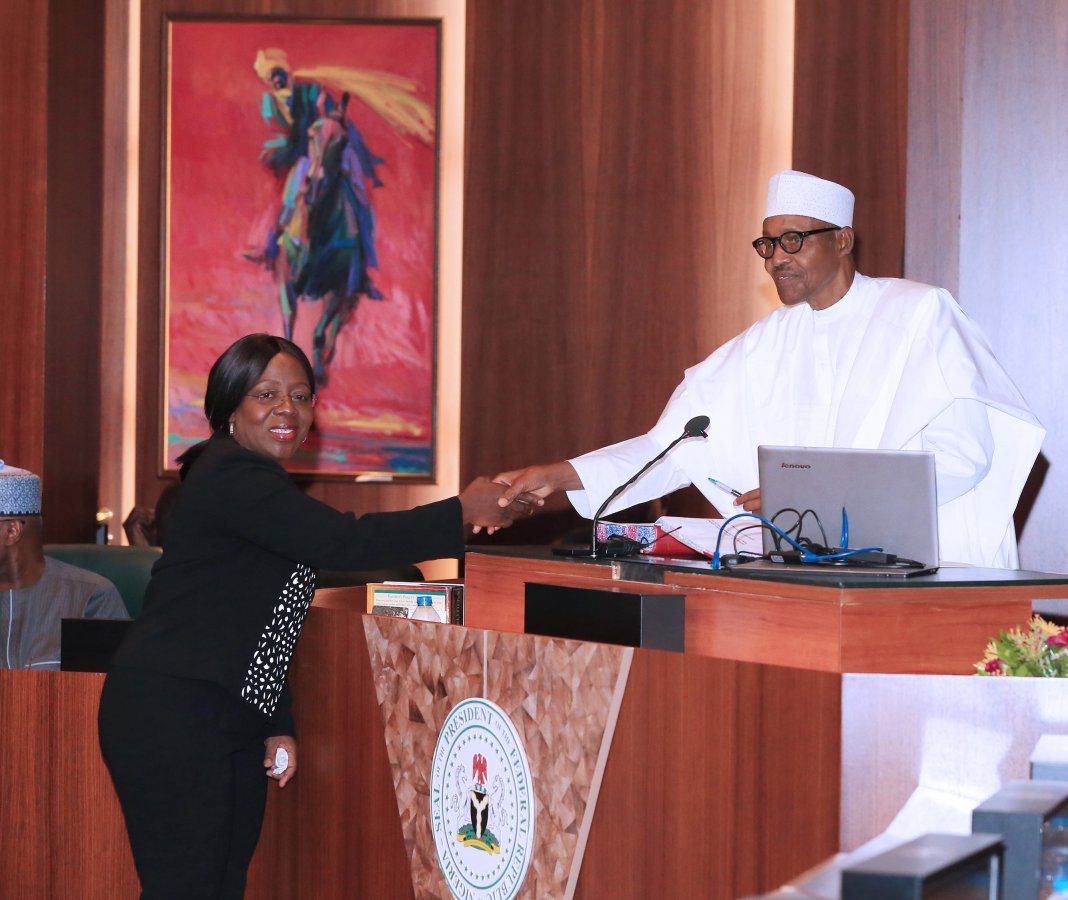 BREAKING: Buhari swears-in eight new permanent secretaries