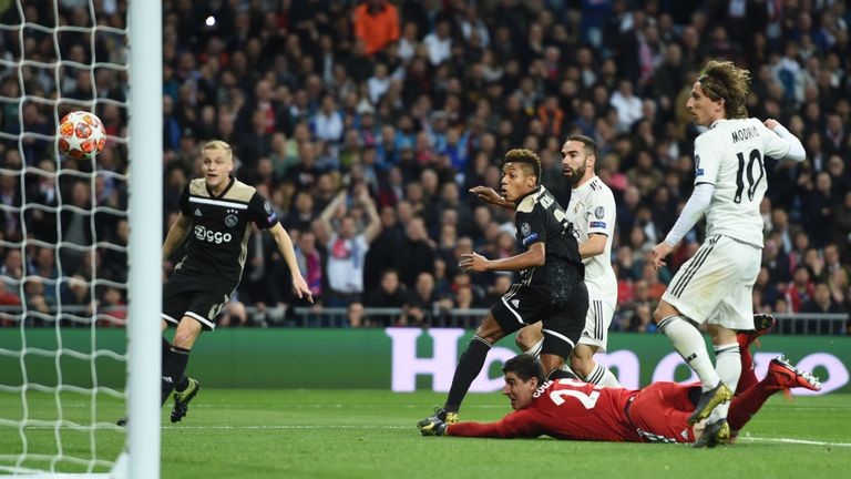 Ajax knock Real Madrid out of Champions League as Tottenham pulls through