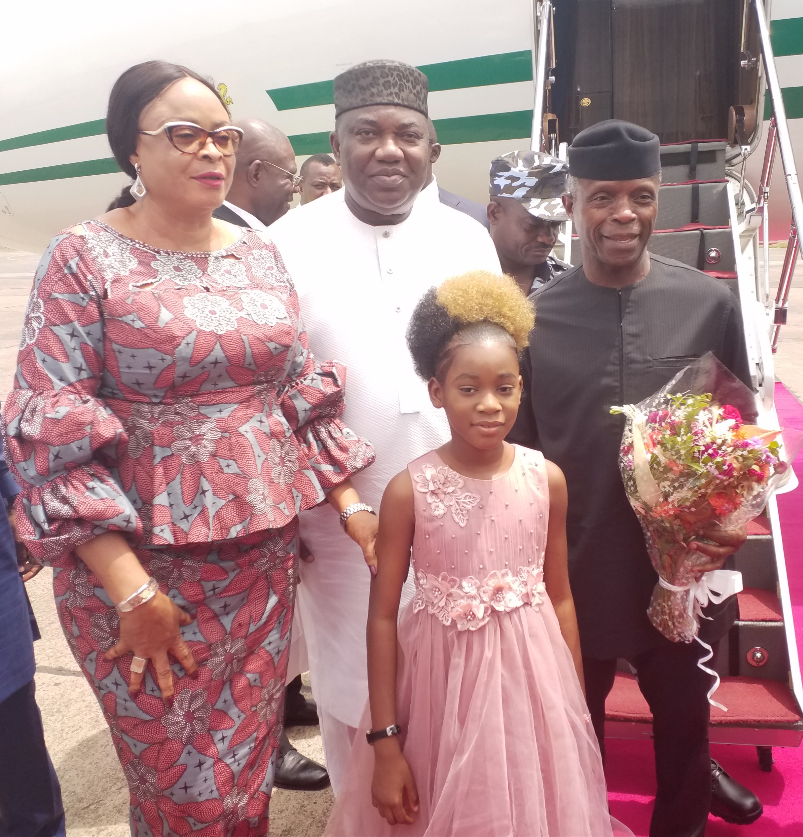 Vice President Yemi Osinbajo (right) with Governor Ifeanyi Ugwuanyi of Enugu State (middle), his deputy, Hon. Mrs. Cecilia Ezeilo (left) and the bouquet bearer, Princess Daluchukwu Nnaji, during the airport reception for the Vice President in Enugu on his way to Anambra State for an official engagement, on Friday. 