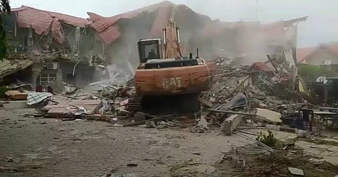 FCTA demolishes Abuja strip club, Caramelo Lounge, targets others