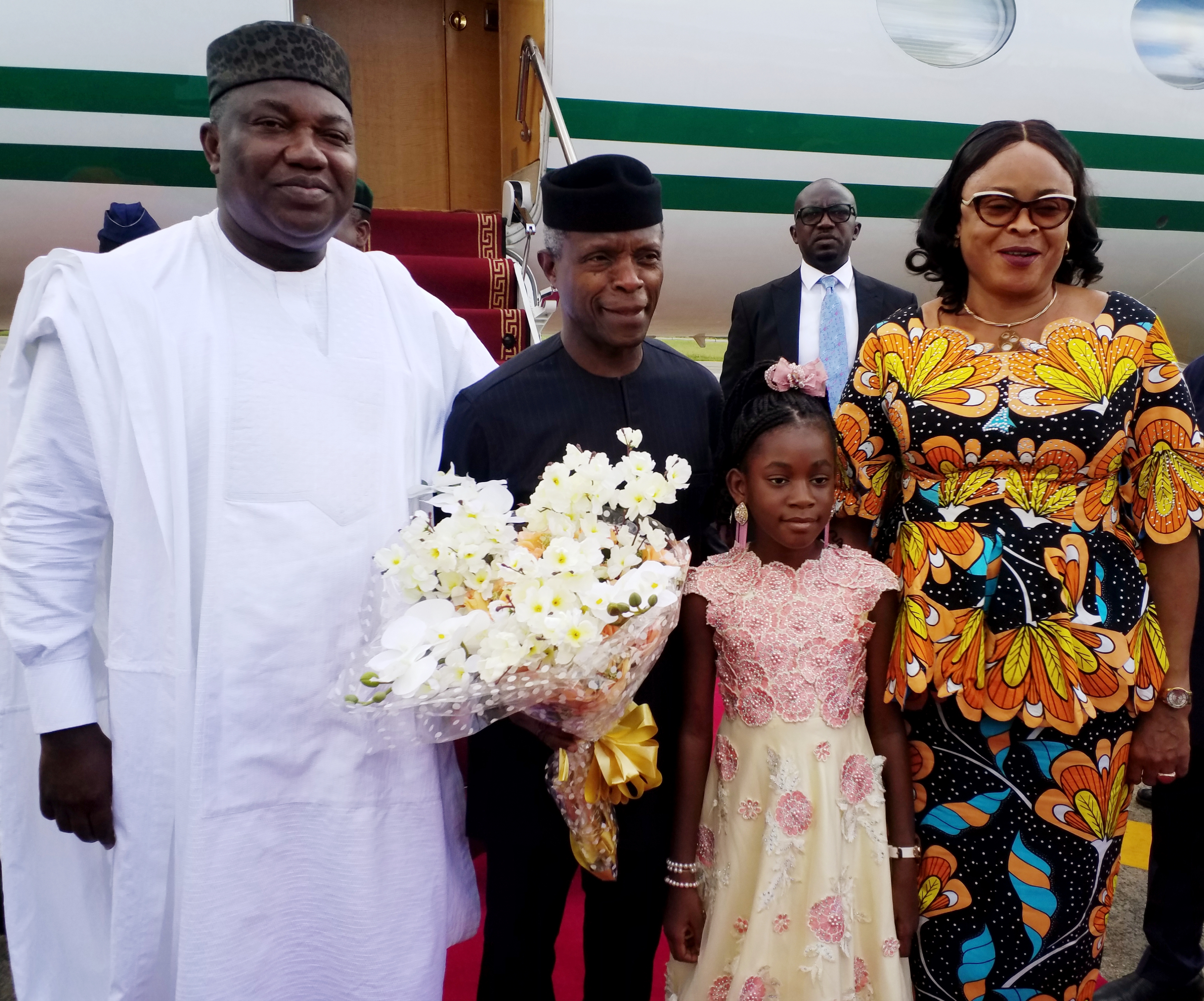 L-R: Enugu State Governor, Rt. Hon. Ifeanyi Ugwuanyi; Vice President, Prof. Yemi Osinbajo; bouquet bearer, Princess Daluchukwu Nnaji and the state’s Deputy Governor, Hon. Mrs. Cecilia Ezeilo, during a warm reception for Prof. Osinbajo at the Akanu Ibiam International Airport, Enugu, on his way to Anambra State for an official engagement, yesterday.