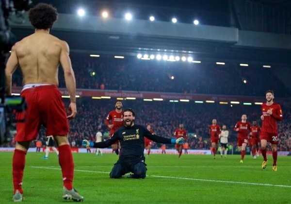 Liverpool beat Man Utd 2-0 to maintain grip on Premier League title