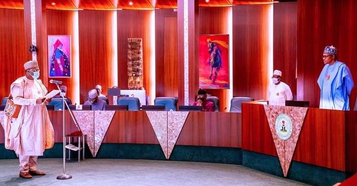 Pres. Buhari swears in INEC Chairman
