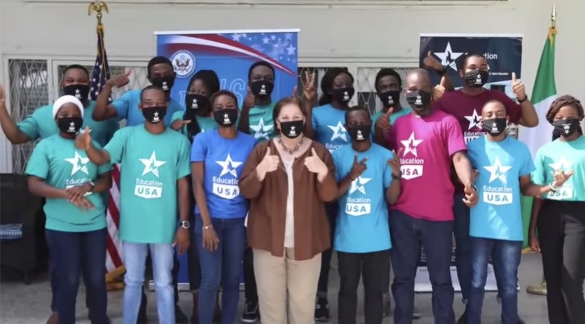 The 19 Nigerian scholarship winners, with US consul-general in Lagos Claire Pierangelo