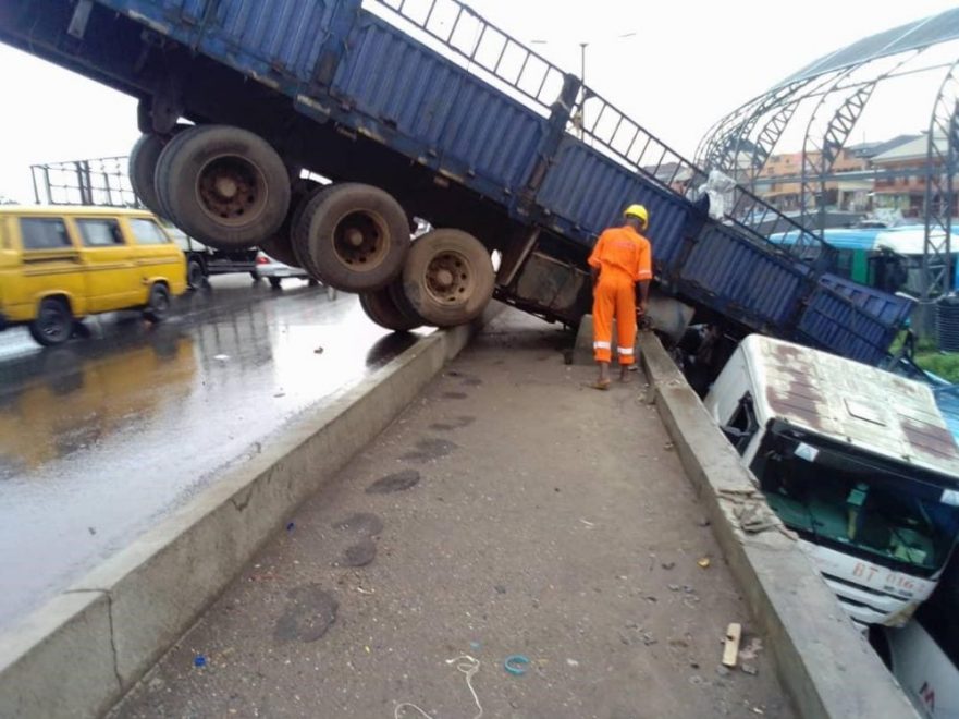 Many escape death as trailer falls into bus terminal from Lagos bridge