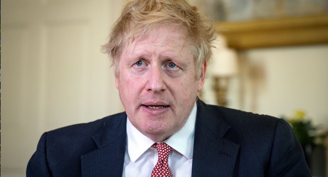 Omicron: Boris Johnson announces home-working, mandatory vaccine passports in England