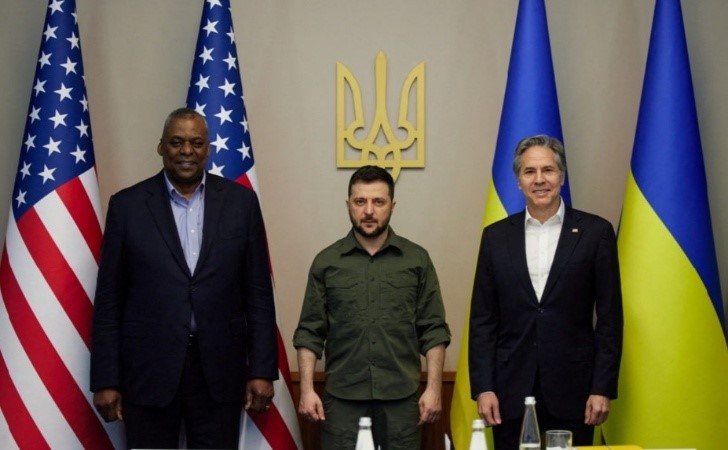 Ukraine claims battlefield gains as US pledges more military aid