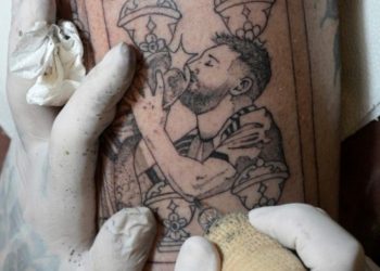 Argentine fans line up for Messi tattoos