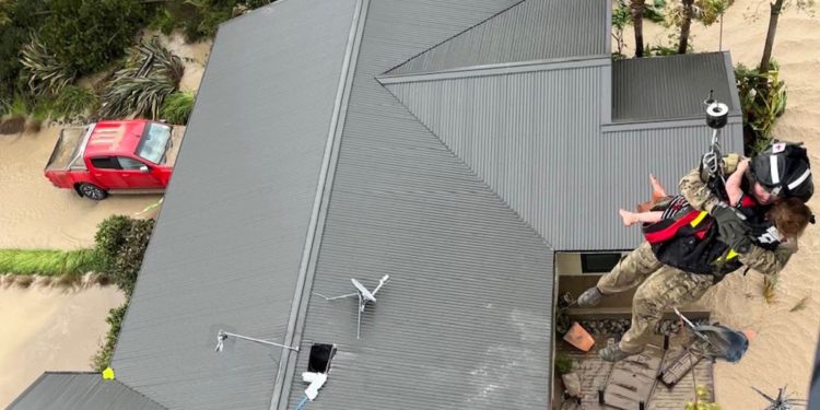 Rescuers pluck survivors from rooftops as New Zealand cyclone kills 3