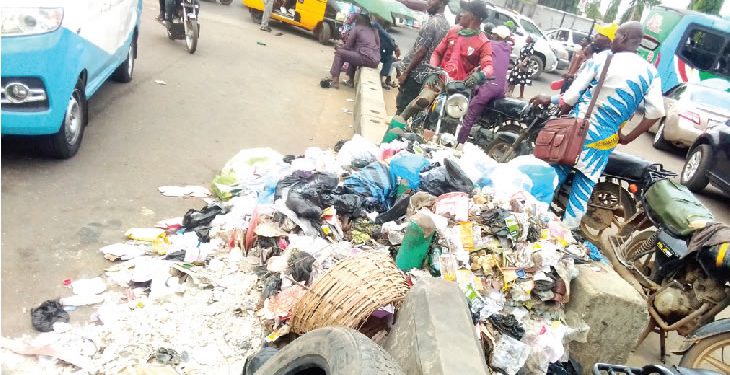 Traders lament as refuse takes over Lagos road