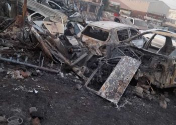 Suspected Ugandan arsonist sets fire to Nigerians’ bizmen’s auto workshop, damages 9 cars