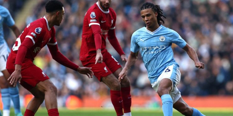 Liverpool hit back to hold Man City, end Etihad winning streak