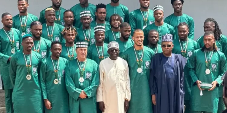 Tinubu rewards Super Eagles with national award, plots of land, flats in FCT