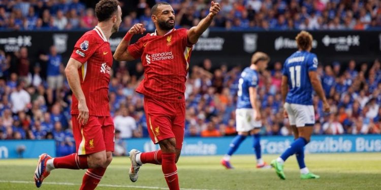 Liverpool beat Chelsea 2-1 to go top of premier league