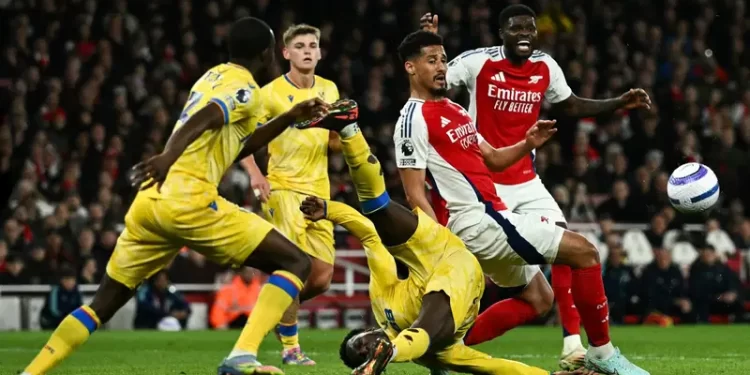 Liverpool on brink of title after Arsenal draw with Palace