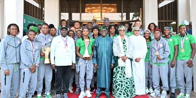 Tinubu honours triumphant Super Falcons with national honours, apartments, $100,000 cash each