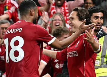 Liverpool score two late goals to win league opener against Bournemouth
