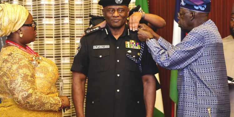 BREAKING: Tinubu decorates Disu as acting Police IG