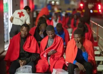 Spain moves to grant legal status to 500,000 migrants