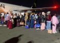 Two children return alone as IOM evacuates 182 Nigerians from Libya