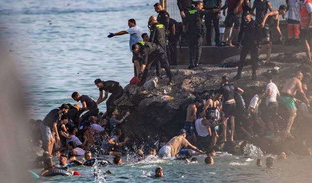 Ceuta calls for emergency as thousands of migrants cross into Spanish territory