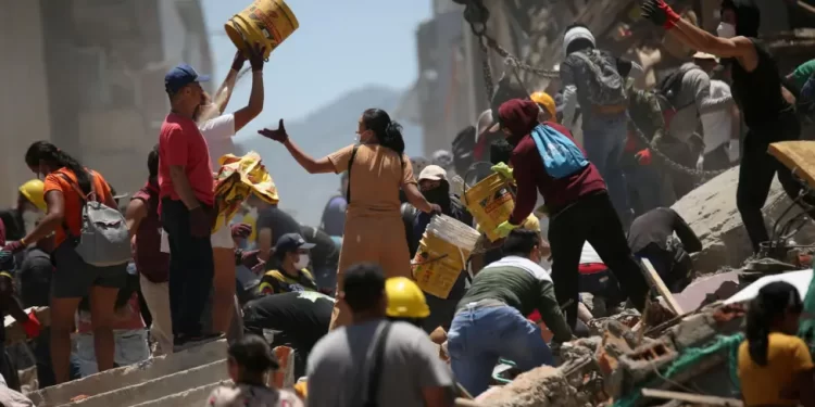 Rescuers scramble for survivors with 180 dead in Colombia earthquake